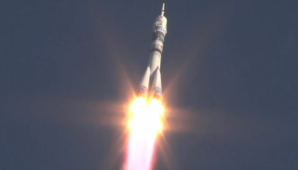 Olympic Torch Launches Into Orbit with New Space Station Crew